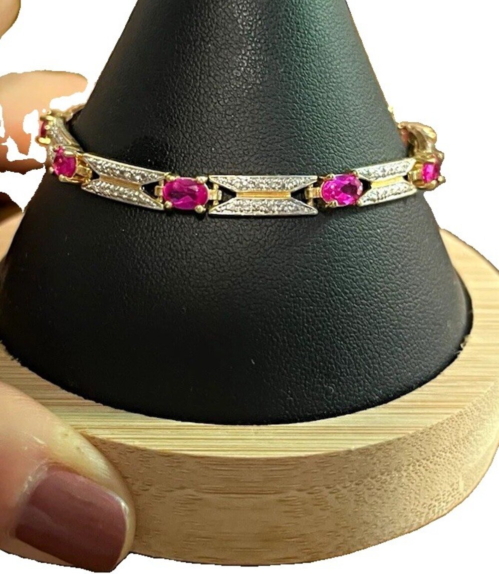 Ross Simons gold over Sterling ruby and diamond bracelet . Size 7 . Marked
